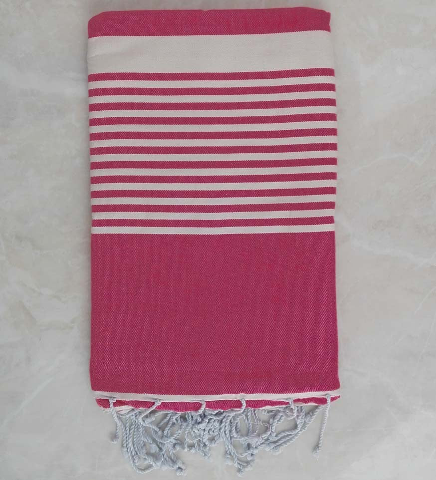 Jeté rose avec rayures 