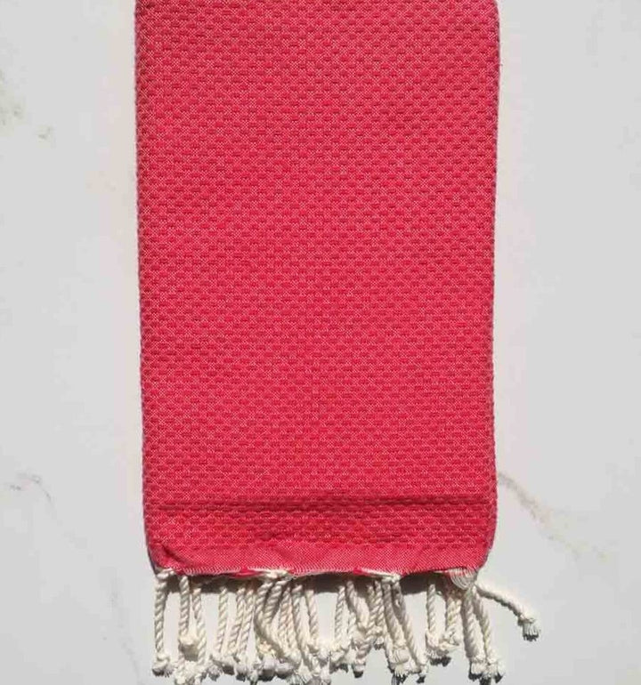 Fouta nid d'abeille unie couleur rose bonbon