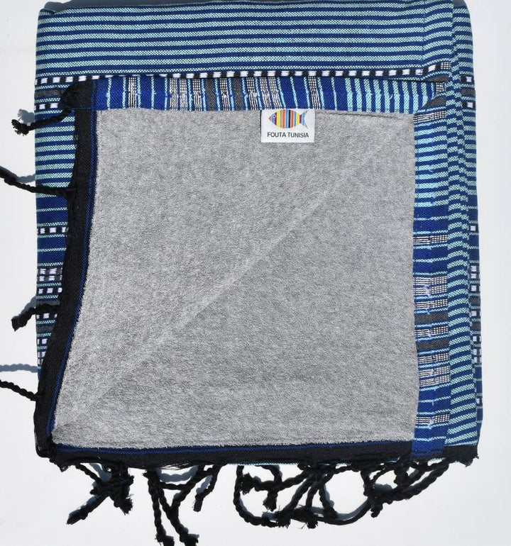 Fouta bleue à rayures doublée éponge grise