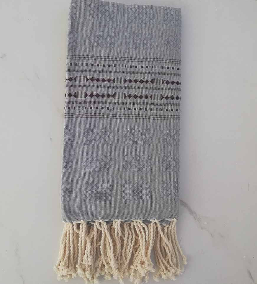 Fouta thalasso bleu avec motifs aubergine 