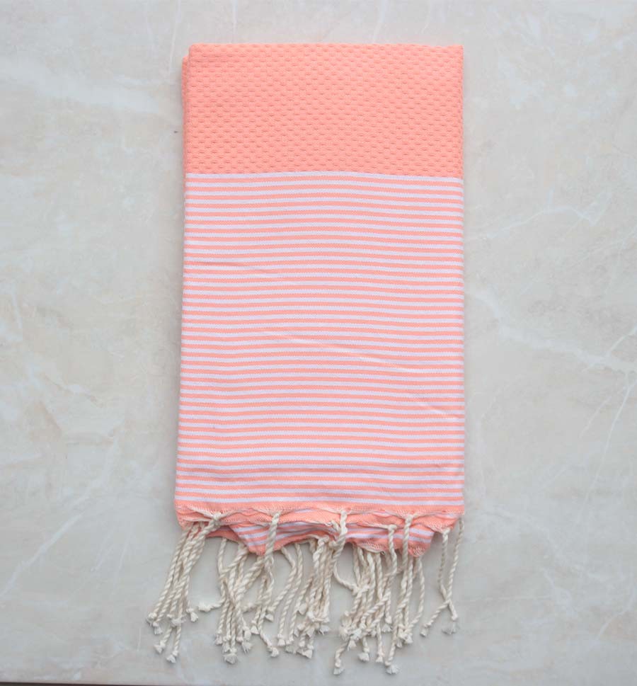 Fouta nid d'abeille rose saumon clair rayée blanc 