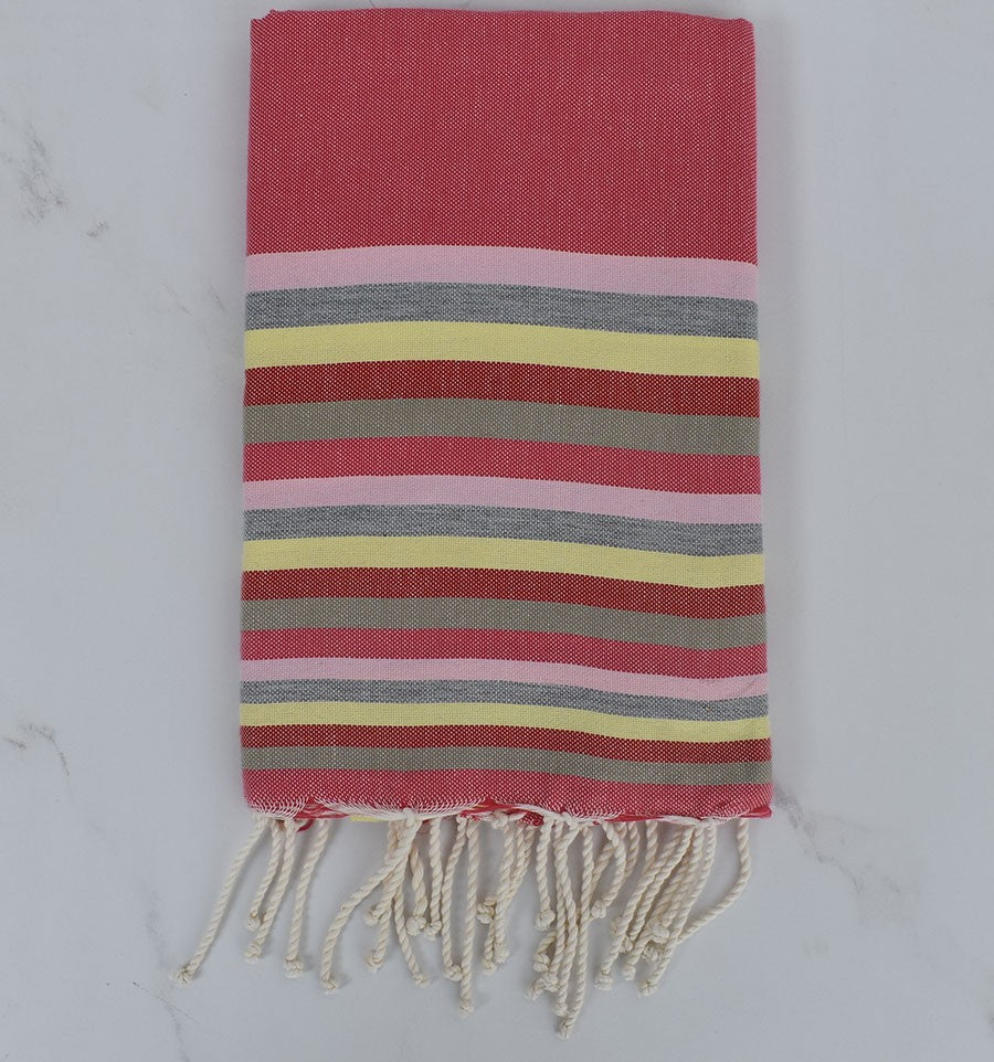 Fouta plate 6 couleurs rose, rose clair, gris, jaune, rouge et vert pale 
