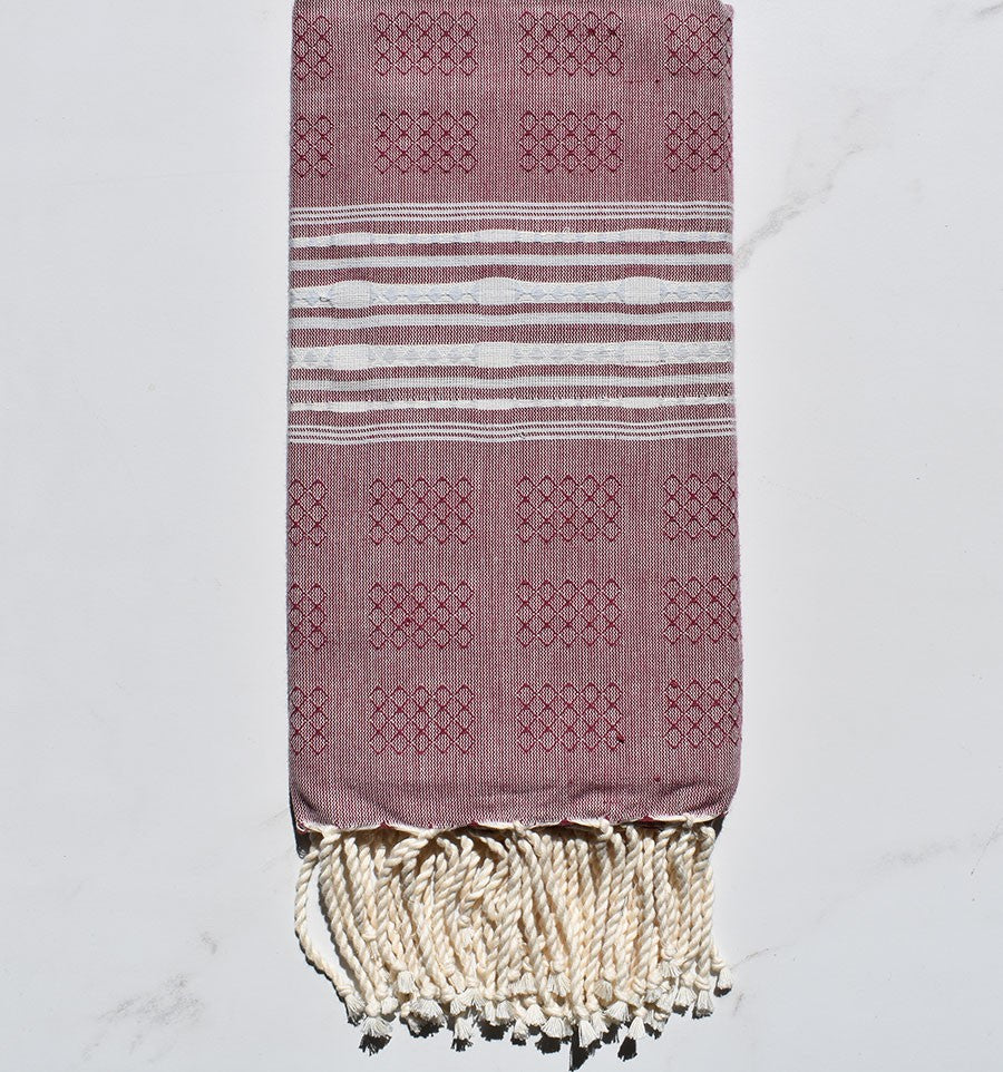 Fouta thalasso amarante foncé avec motifs bleu fumée 