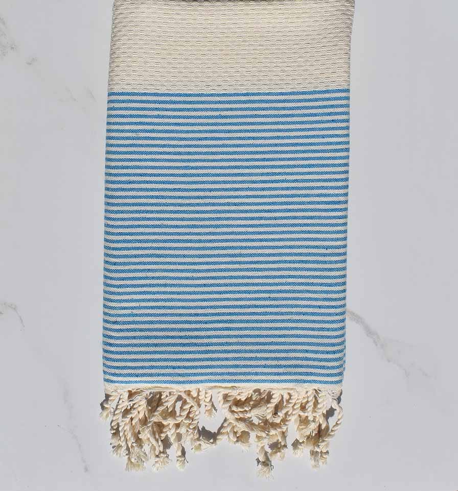 Fouta nid d'abeille crème rayée bleu 