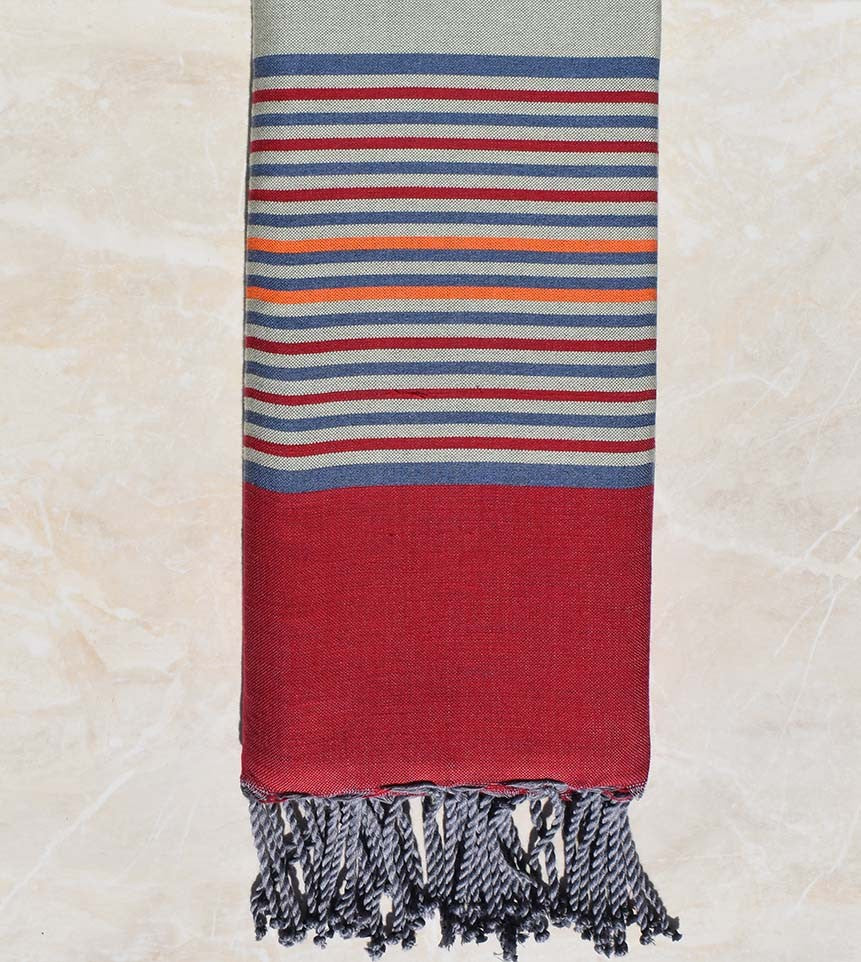 Jeté vert avec rayures bleu guède, rouge et orange 